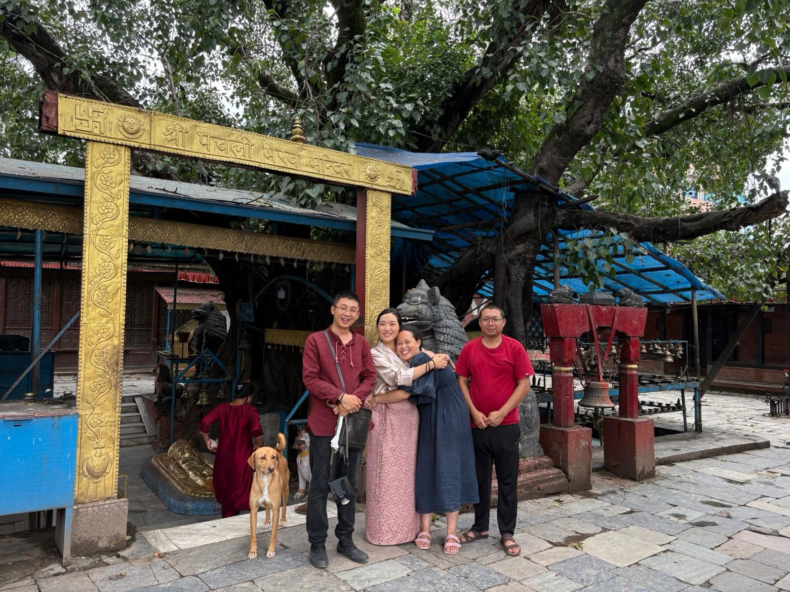 A group of visiting pilgrims in the courtyard at Pachali Bhairava, Kathmandu